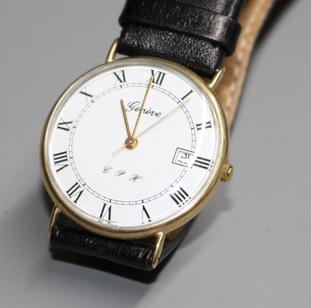 A gentlemans 9ct gold quartz? dress wrist watch, with Roman dial and date aperture, on associated leather strap.